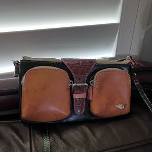 Consuela purse slightly stained used twice leather